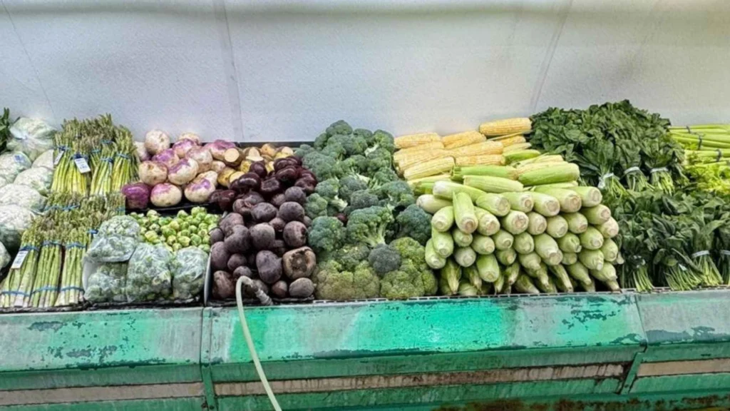 Beets, broccoli, squash and corn stacked on the produce stand at Butcher & Farmer Market in Buckeye, AZ.