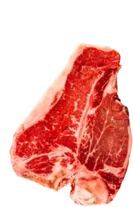 Raw T-bone steak with rich marbling, custom cut to order by the full-time butcher at Butcher & Farmer Market in Buckeye, AZ