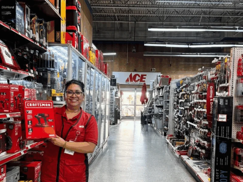 Smiling team member in the tool aisle at Del Sol Ace Hardware in San Luis, AZ