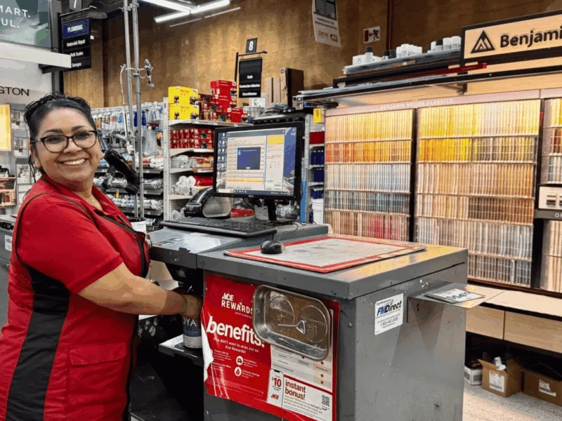Team member at the Benjamin Moore paint counter at Del Sol Ace Hardware in San Luis, AZ