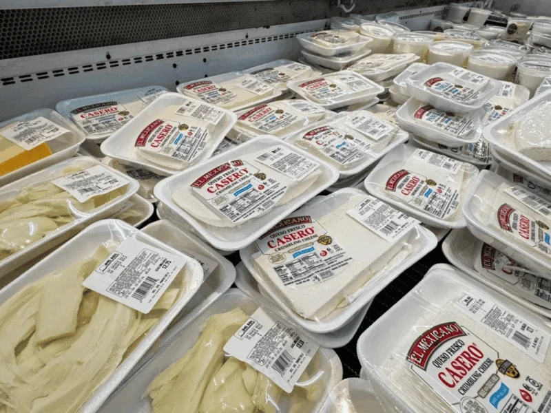 Refrigerated deli case with pre-packaged deli items at Del Sol Market San Luis East in San Luis, AZ