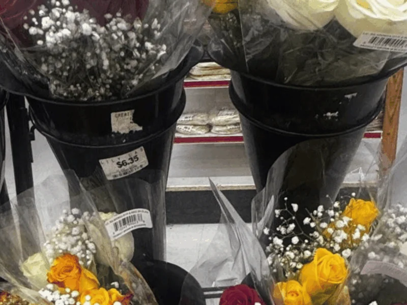Fresh flower bouquets with roses and baby's breath in the floral department at Del Sol Market San Luis East in San Luis, AZ