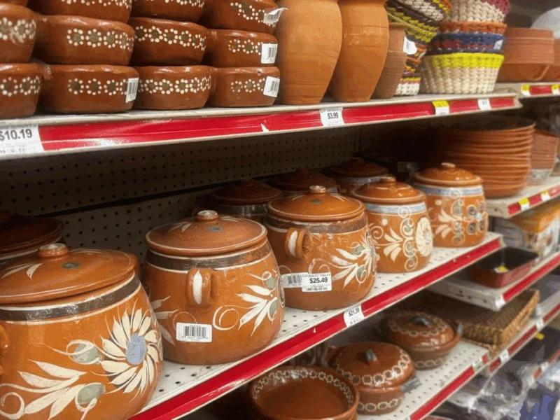 Traditional Mexican clay pots (ollas de barro) in the household aisle at Del Sol Market San Luis East in San Luis, AZ