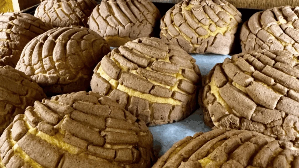 Fresh conchas (Mexican sweet bread) in the bakery at Del Sol Market in San Luis, AZ