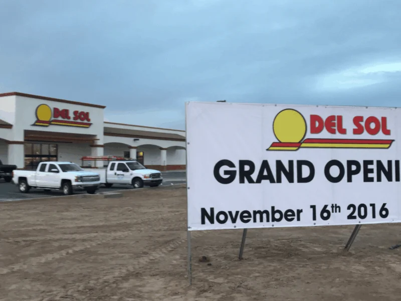 Del Sol grand opening sign dated November 16, 2016 in front of the new Somerton, AZ store
