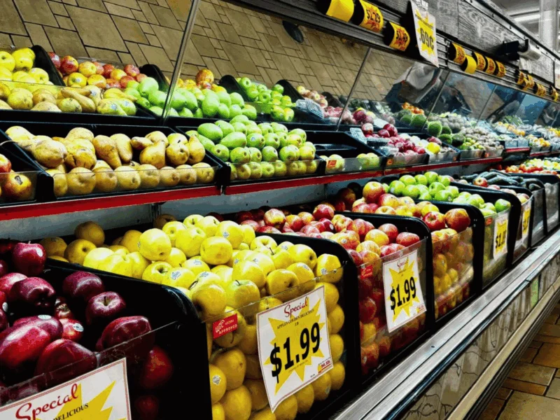 Produce aisle with fresh apples, pears and fruit at Del Sol on 16th Street in Yuma, AZ