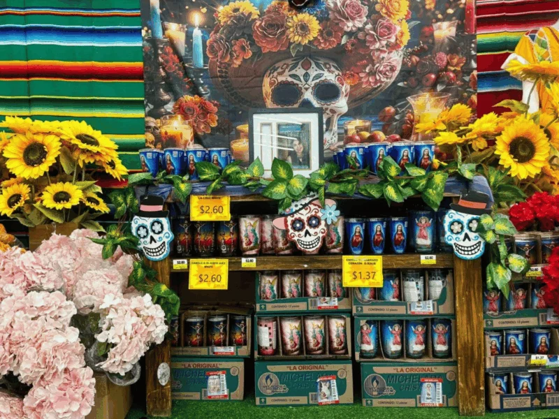 Día de los Muertos display with sunflowers, sugar skulls and papel picado at Del Sol on 4th Avenue in Yuma, AZ