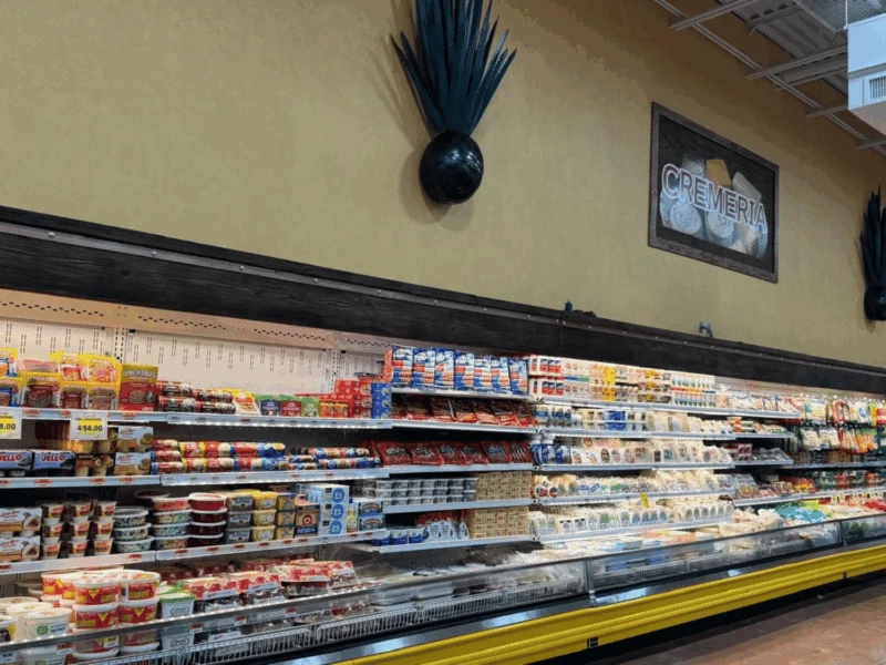 Long refrigerated deli case with lunch meats and cheeses at Del Sol in the Yuma Foothills, AZ