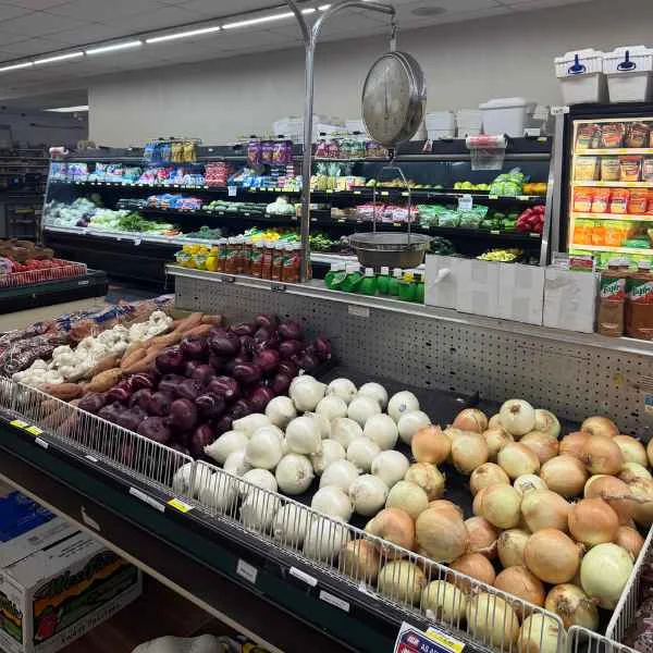 Red onions, white onions and yellow onions in the produce department at Food Town IGA in Eloy