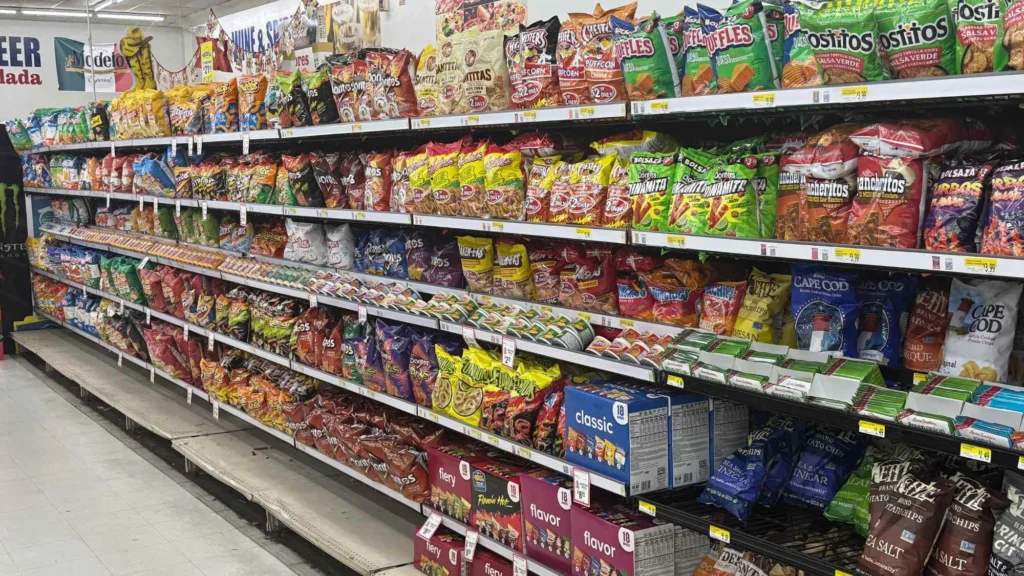Long snack aisle with chips, tortilla chips and salsas