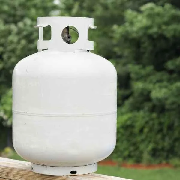 White propane tank outdoors