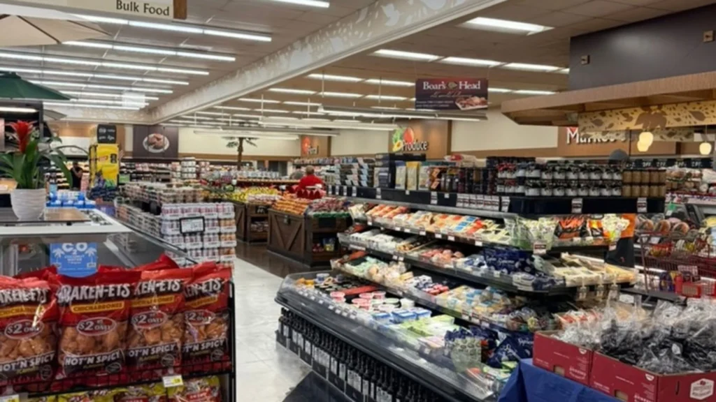 Wide interior view of Keil's with bulk foods, Boar's Head deli and cheese cases