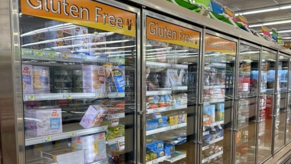Row of freezer doors labeled Gluten Free with gluten-free frozen foods