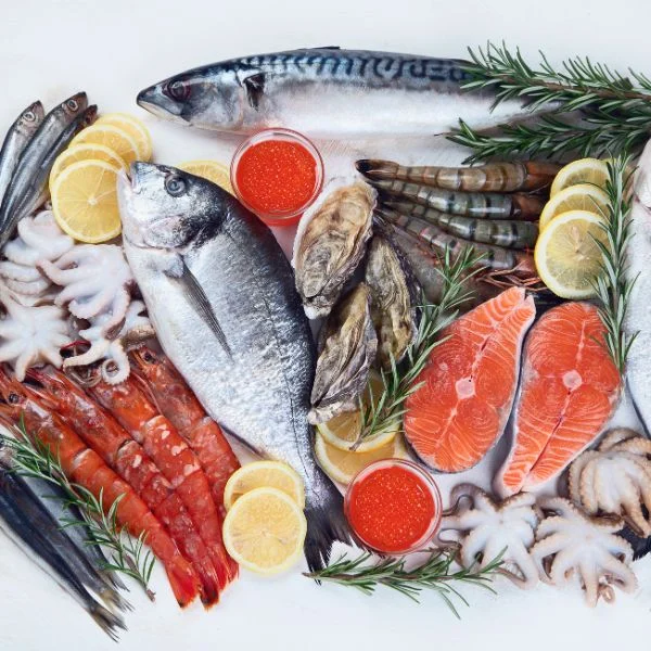 Fresh fish, shrimp, oysters, salmon steaks and octopus with lemon and rosemary
