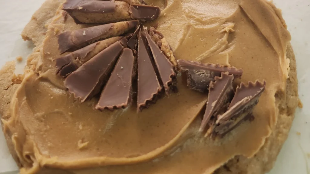 Peanut butter pie topped with chocolate curls