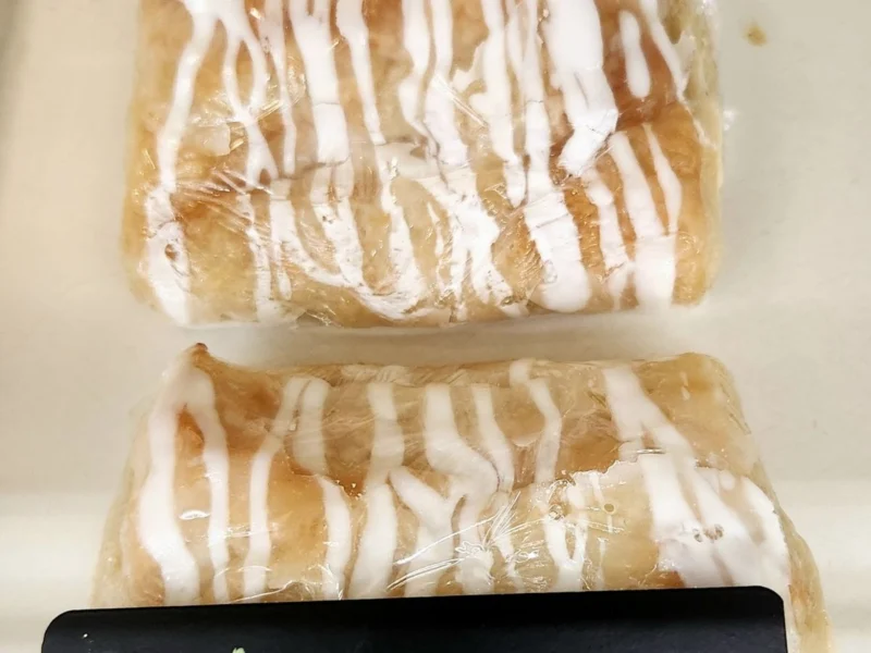 Fresh danish pastries drizzled with white icing