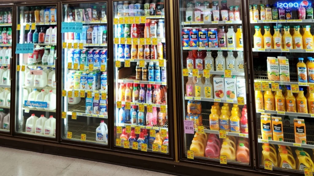 Dairy coolers stocked with milk, juice and creamer