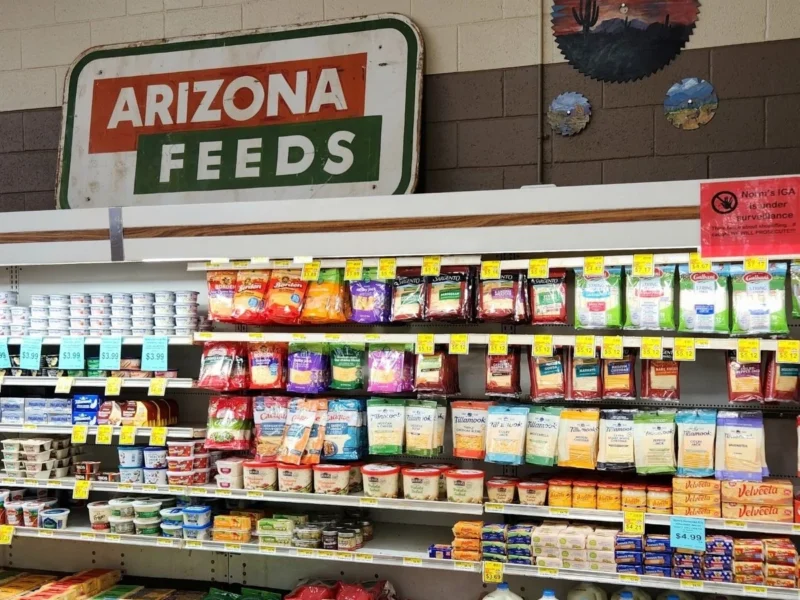 Vintage Arizona Feeds sign above the refrigerated aisle