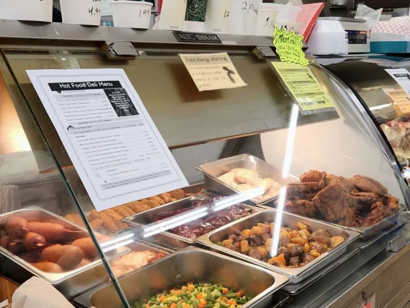Hot deli case filled with ready-to-eat meals