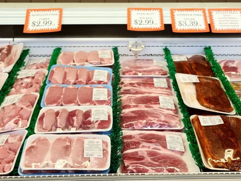 Fresh pork chops in the meat case