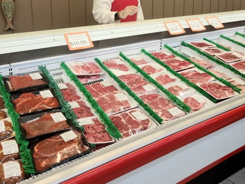 Case of fresh-cut steaks in the meat department