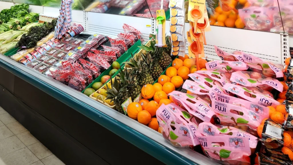 Pineapples and oranges in the produce case