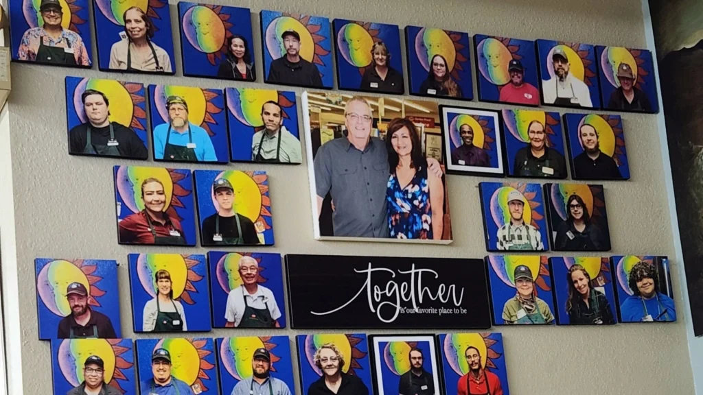 Together portrait wall of the Norm's IGA team