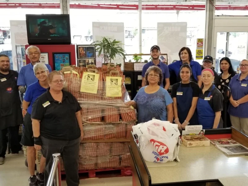 Norm's IGA team with St. Vincent de Paul Food Supply Drive donations