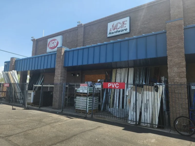 ACE Hardware entrance at Olsens Marketplace with PVC pipe and building supplies outside