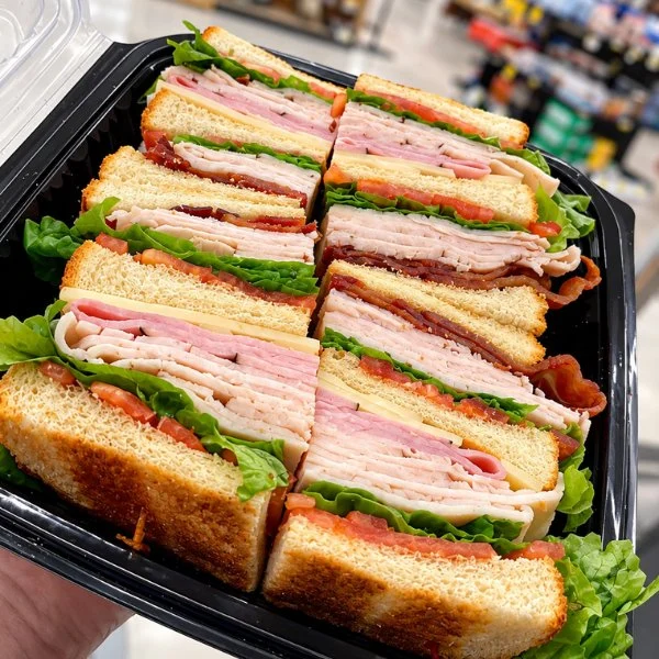 Russell's popular club sandwich from the Olsens Patio Cafe, stacked with ham, turkey, bacon, lettuce and tomato on toasted bread