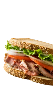 Roast beef sandwich with lettuce, tomato, and cheese. Pick up premade sandwiches with Boar's Head meats at the Tonto Basin Market deli.