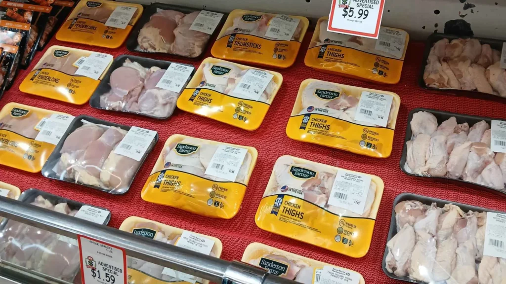 Packages of fresh chicken and pork in the meat case at Tonto Basin Market