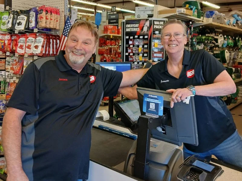 Co-assistant store managers James Royse and Jeanette Weimer at the Tonto Basin Market register