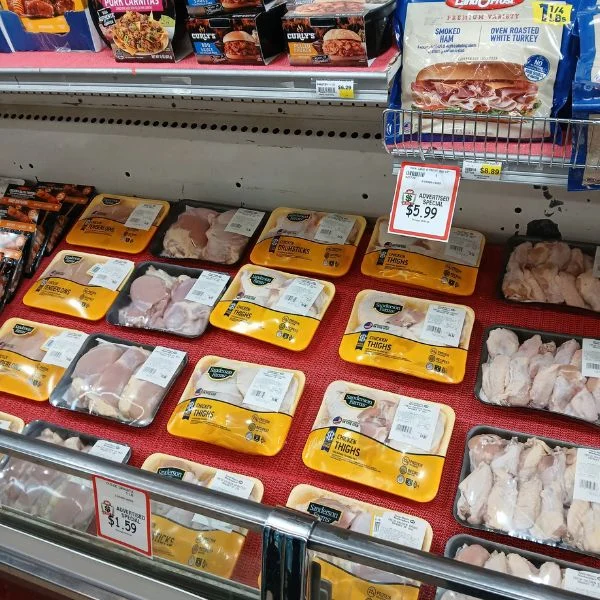 Packages of fresh chicken in the meat case at Tonto Basin Market
